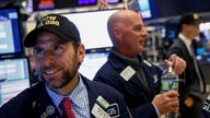 Dow zooms to 23,000 for first time