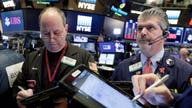 Stock futures pause ahead of retail sales data