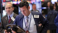 Stocks slip off records as hot inflation overshadows strong bank earnings