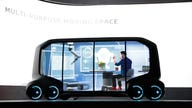 Toyota unveils self-driving concept vehicle for rides, deliveries