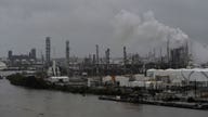 Gasoline jumps, crude down; Harvey shuts 24% of U.S. refining