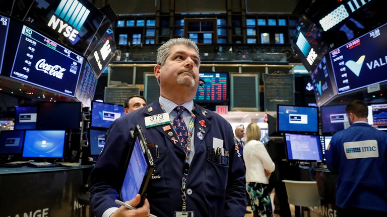 Stocks slide as oil surges to 7-year high