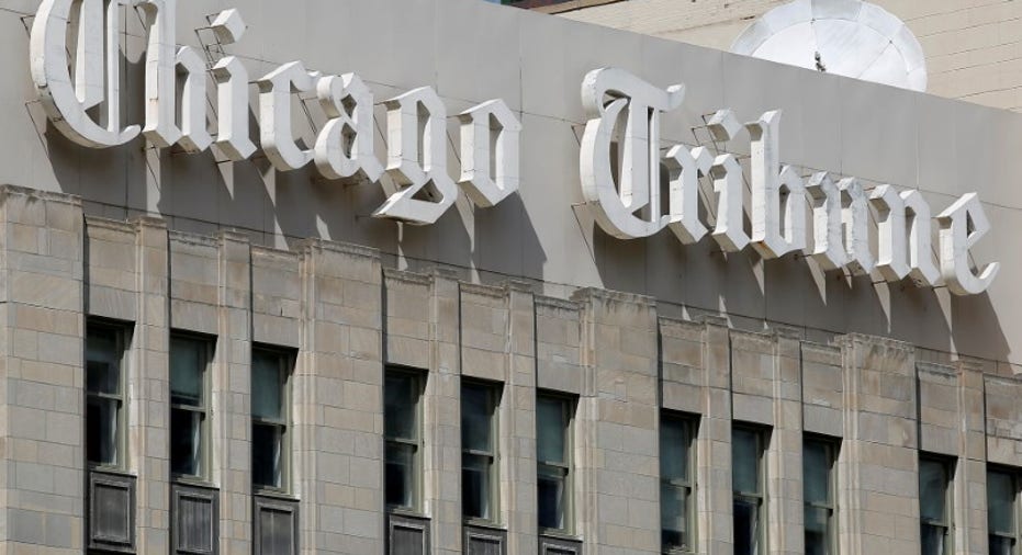 TRIBUNE-PUBLSHNG-M-A-GANNETT-CO