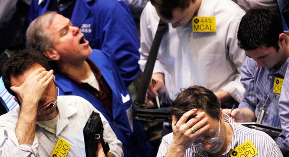 Traders at the New York Mercantile Exchange