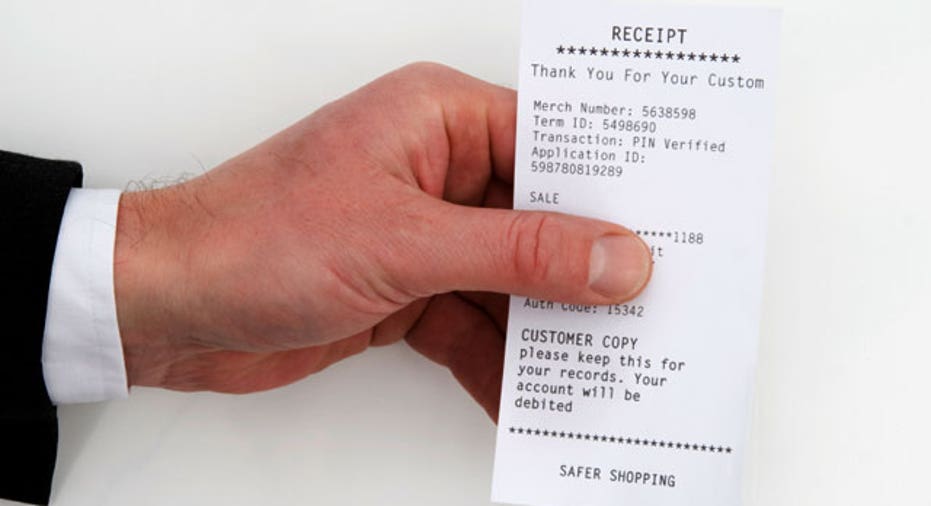 Man Holding a Receipt