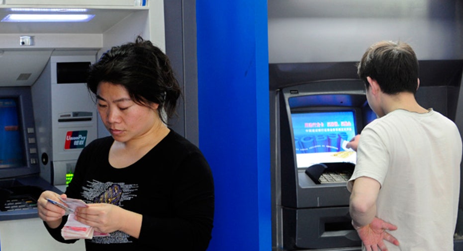 People Using ATMs