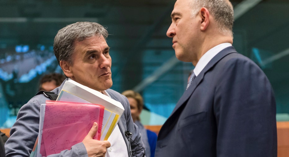 Euclid Tsakalotos and Pierre Moscovici Greece AP FBN