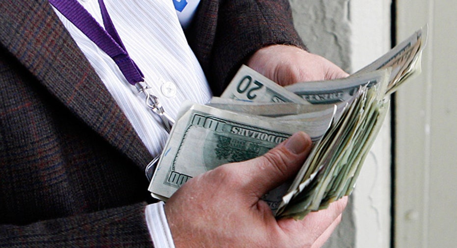 Man Counting Money Cash Dollars