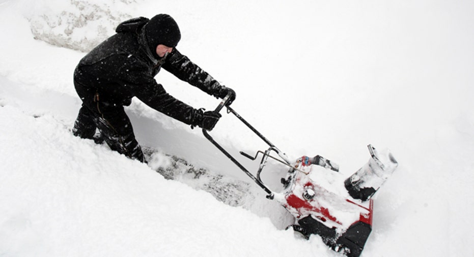 Man snowblowing