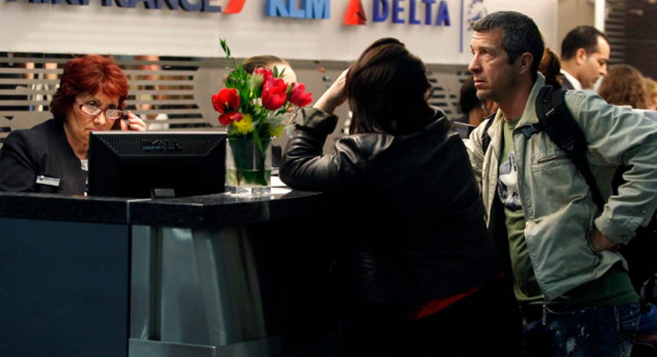 People checking in at airport