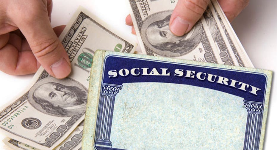 Social Security Card With Cash in Hands