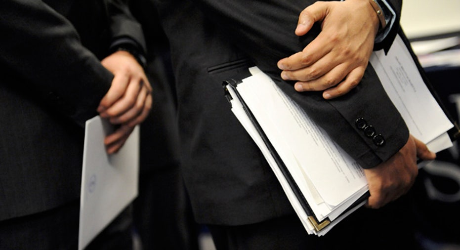 Woman_Holds_Resume_Interview_Job_Fair