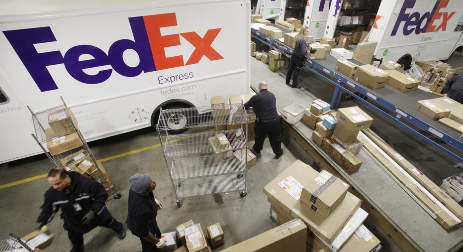 FedEx trucks loading FBN