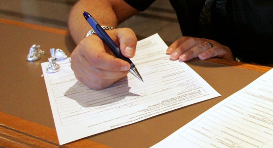 business owner filling out papers