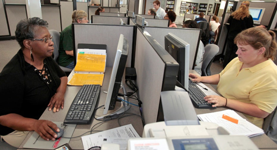 Employees on Computers in the Office