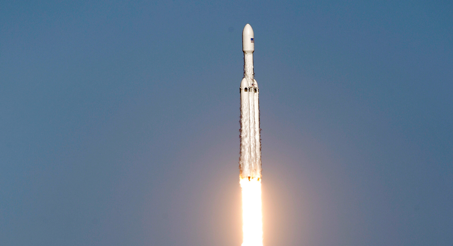 SpaceX Launches New Megarocket With Tesla Car On Board | Fox Business