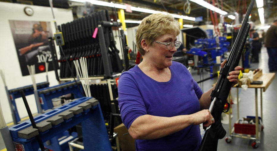 Ruger worker assembling rifle FBN