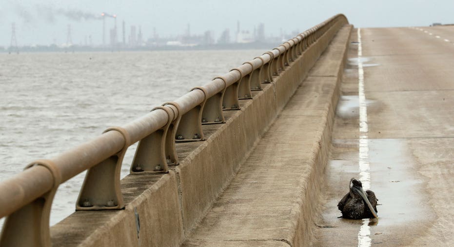 Hurricane Harvey bridge with refinery in background AP FBN