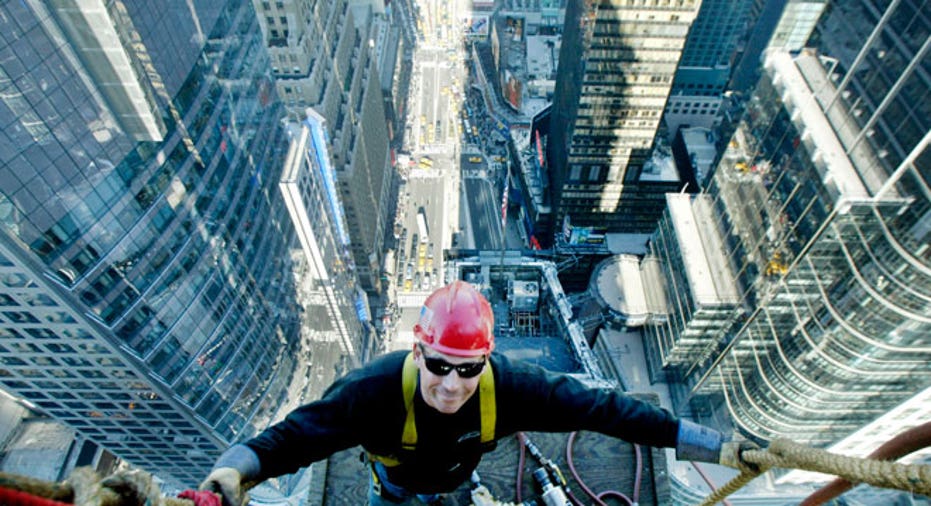 harnessed iron worker, skyscraper, NYC