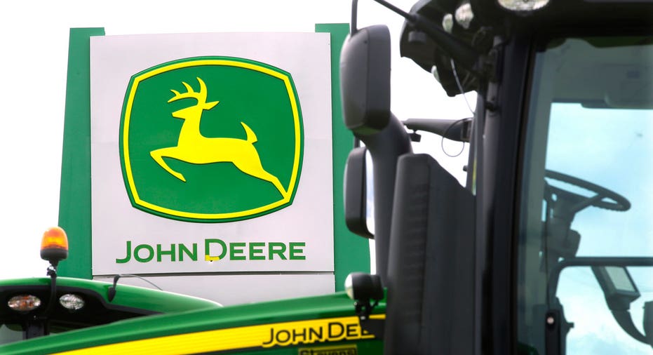 John Deere tractor and dealer sign FBN