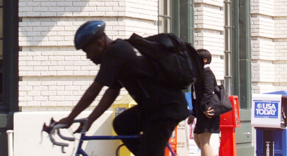 man riding bike