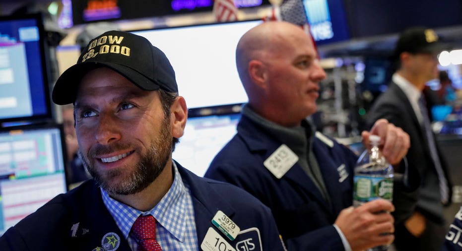 NYSE trader wearing Dow 23,000 hat FBN
