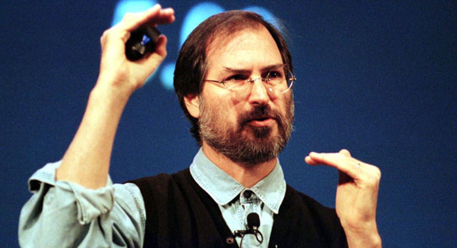 Steve Jobs talks during a presentation, 1997, Reuters