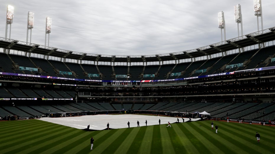 World Series Indians Cubs tarp FBN