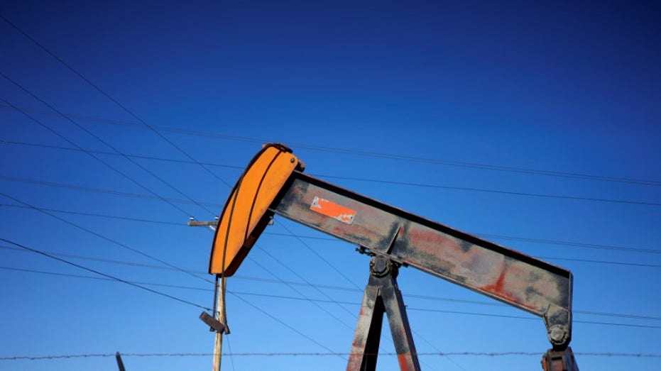 An oil well pump jack an oil field supply yard near Denver, Colorado, Feb. 2, 2015