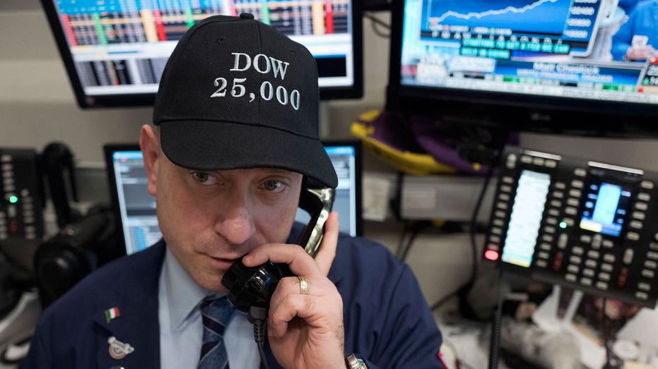 Trader wearing Dow 25000 hat AP FBN