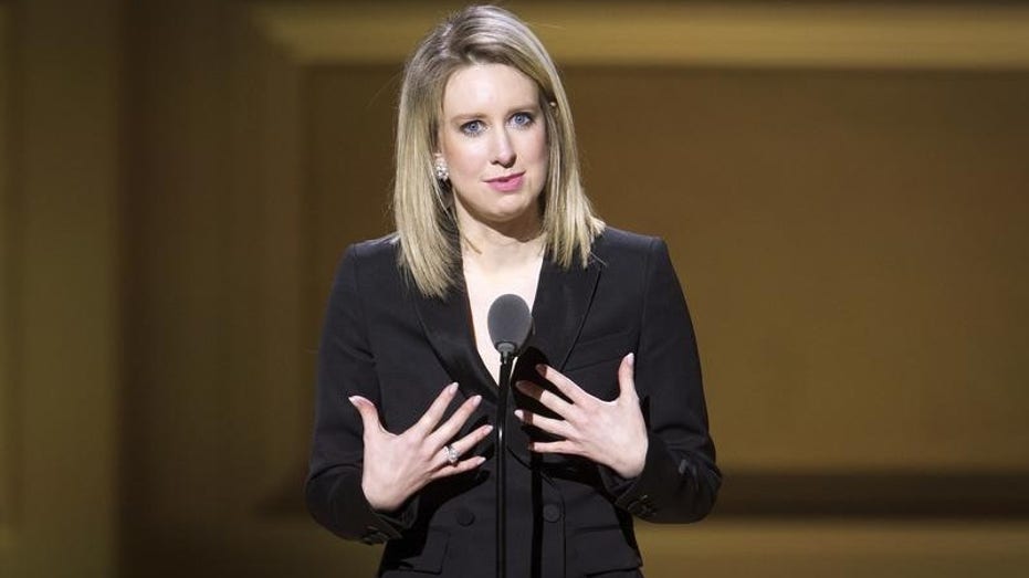 SEC charges Elizabeth Holmes with fraud