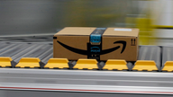 Trump goes after Amazon _ again _ over postal delivery