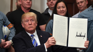 Trump orders stiff trade tariffs, unswayed by grim warnings