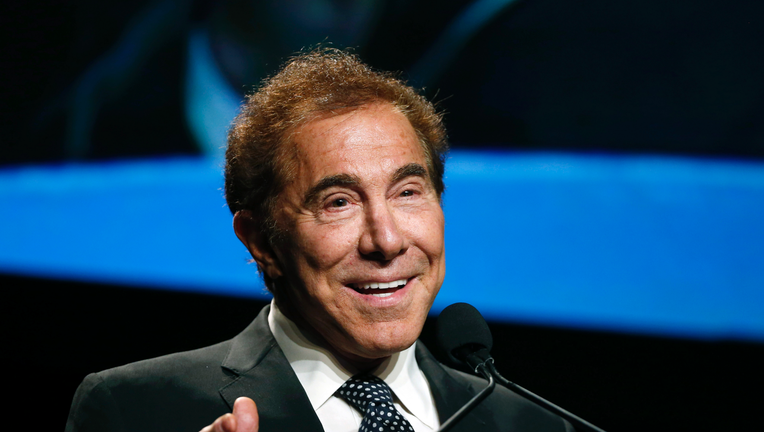 Wynn Resorts to pay $2.6B to settle lawsuit with Japan's Universal Wynn Resorts to pay $2.6B to settle lawsuit with Japan's Universal
