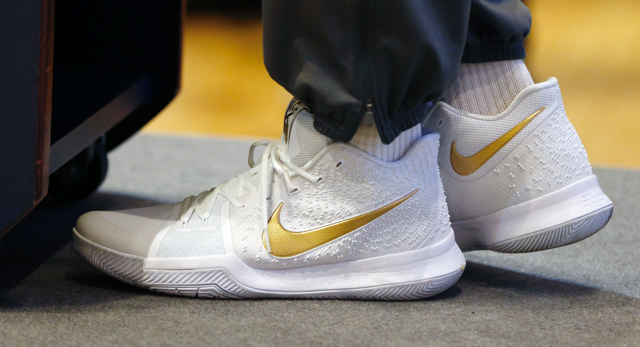 Nike posts loss due to tax law, beats expectations | Business