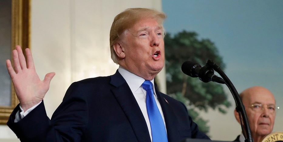 Trade worries send stock market plunging more than 700 points