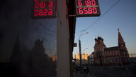 Russian ruble roiled by Trump missile threat, US sanctions