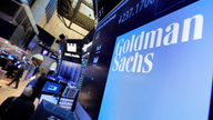 Goldman reports 26 percent surge in profits, helped by taxes