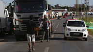 Empty stores, shuttered gas posts in Brazil truckers' strike