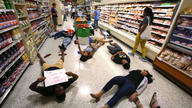 Supermarket suspends political giving amid anti-NRA protest