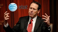 AT&T, Elliott make peace and stock jumps