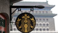 Another Starbucks executive retires, shares fall to multiyear low