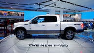 Ford profit dinged by tariffs, truck production