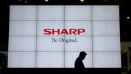 Sharp to buy Toshiba PC business, issue $1.8B in new shares