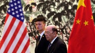 China warns US trade deals off if tariffs go ahead