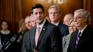 The Latest: House narrowly passes short-term spending bill