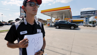 Texas drivers rush to fill gas tanks as pump prices rise