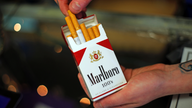 Altria 2Q profit rises on higher cigarette prices, beer