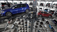Volkswagen raises profit forecast despite diesel charges