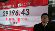 Most Asian shares lower as US tax passage fails to impress